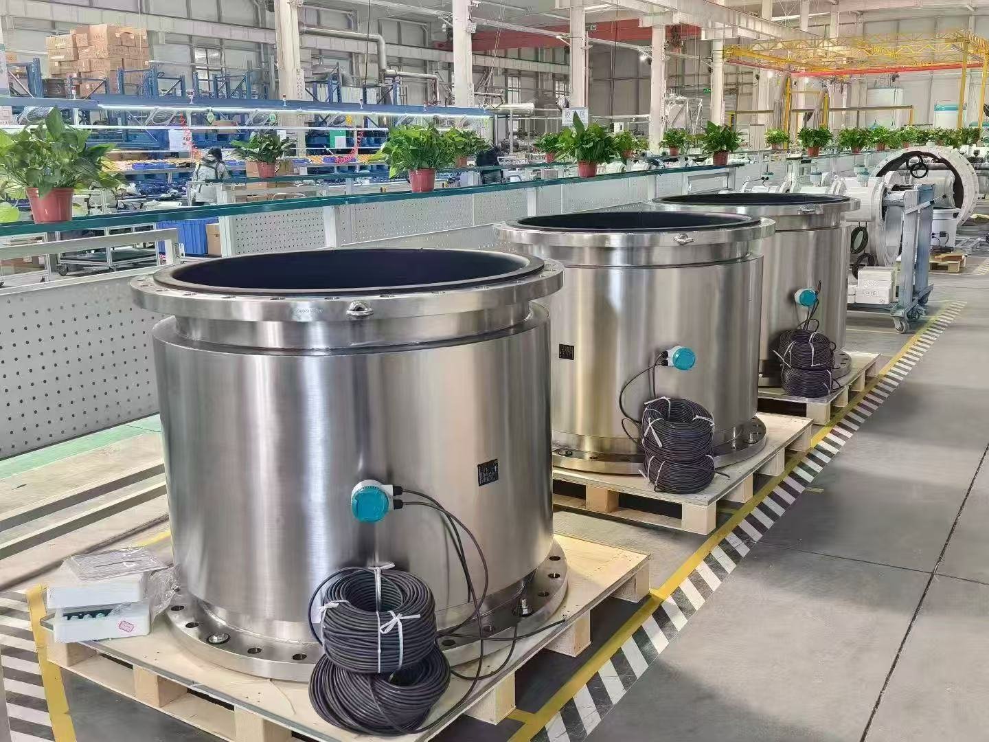 Industrial electromagnetic flow meter installed on pipeline